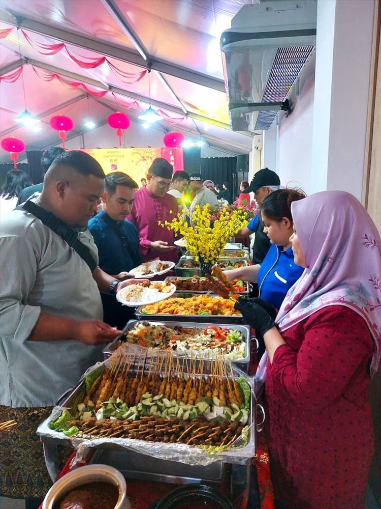 Satay and buffet dishes at an event